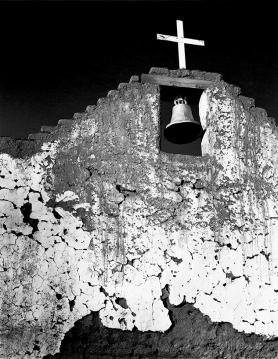 "Cross with Erosion" The San Lorenzo Church (built 1769) at Picuris Pueblo, NM just after the west wall collapsed, 1996
